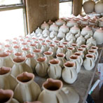 Svend Bayer loading his small kiln 2016